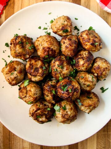Air Fryer Meatballs on a white plate.